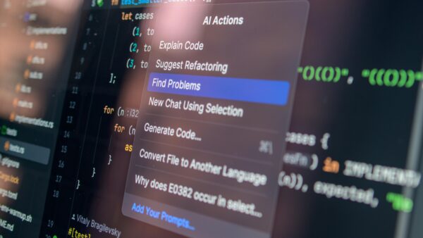 Close-up of AI-assisted coding with menu options for debugging and problem-solving.